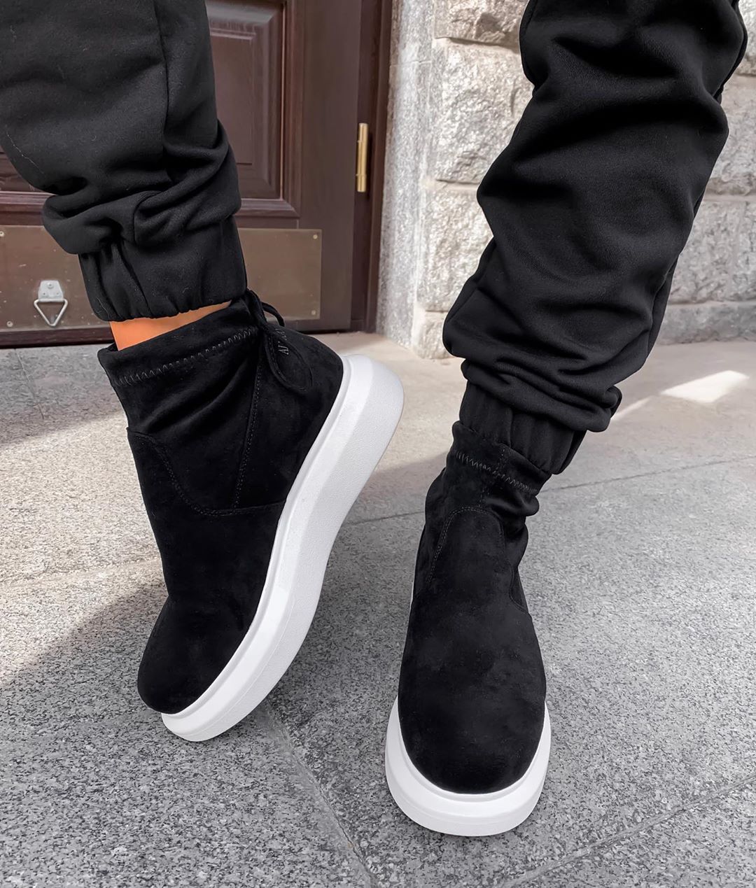 Black high top suede sneakers