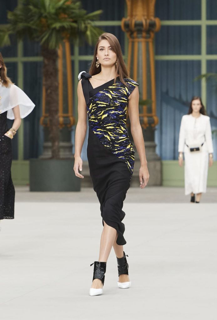 Chanel dress with asymmetric cut.