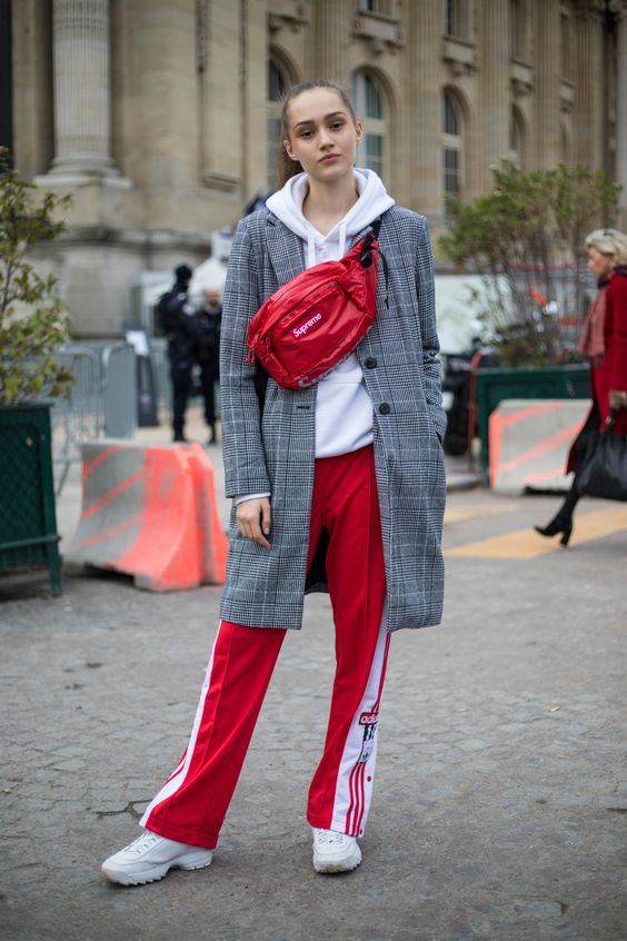 A sporty look with red pants.