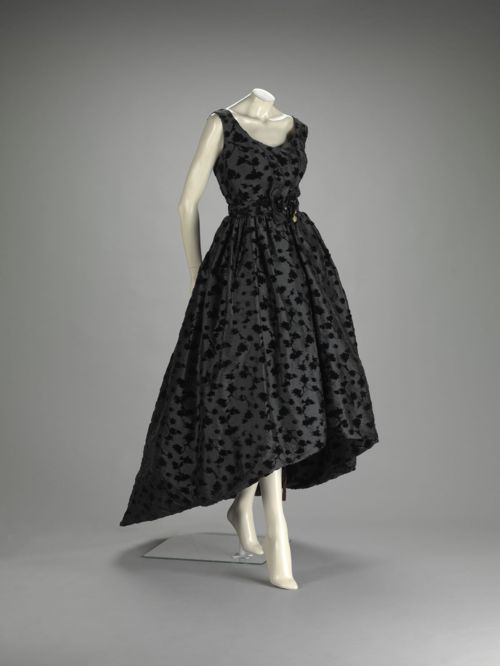 Dress by Cristobal Balenciaga.