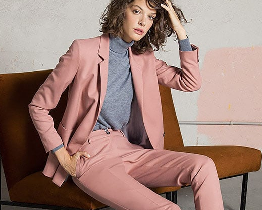 woman in pink suit