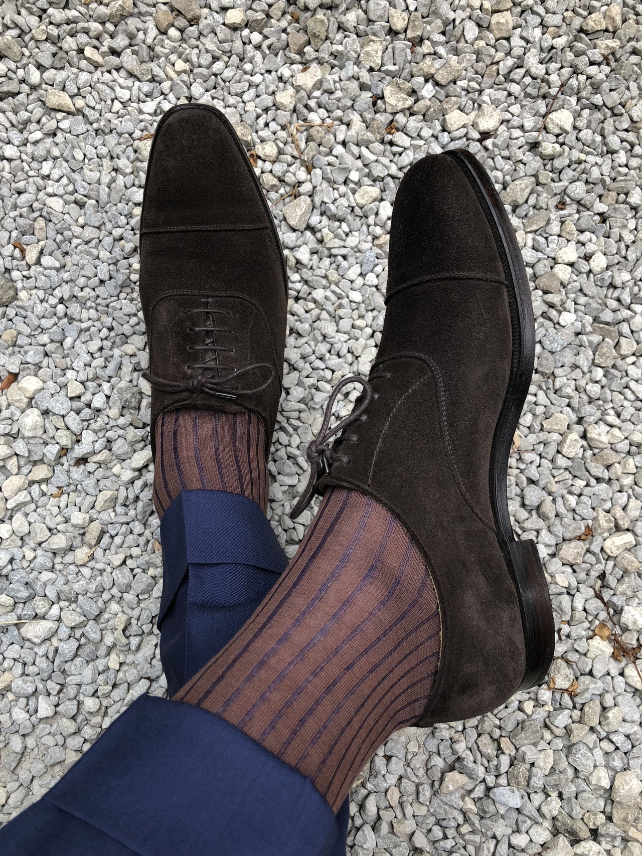 Blue trousers with brown socks