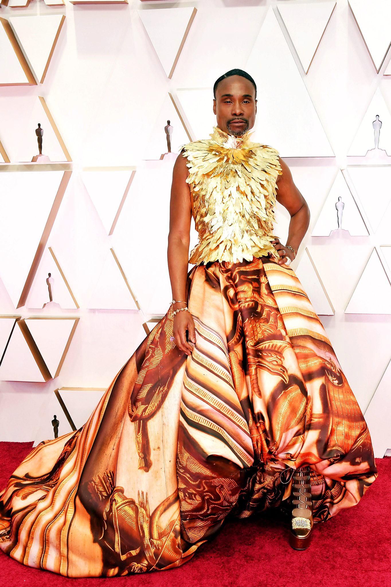 Billy Porter sa isang dilaw na damit