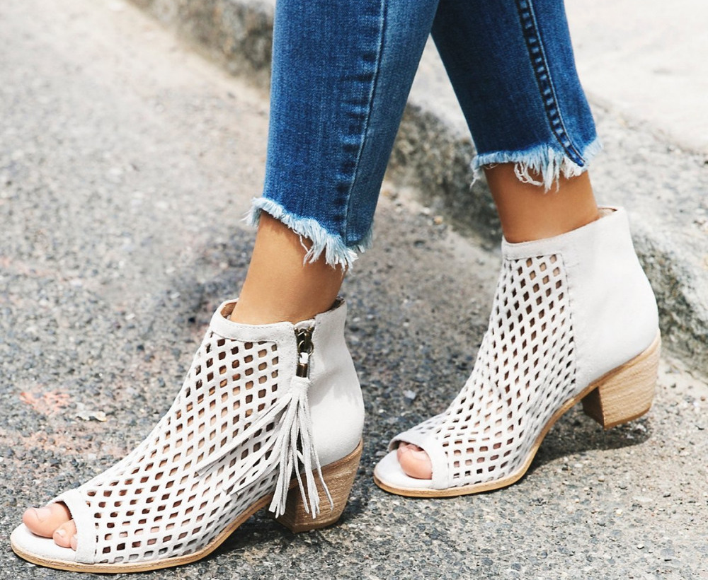 Perforated ankle boots