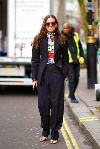 Black jacket combined with a bright blouse