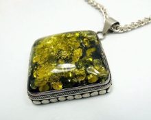 Green amber in silver is suitable for a sign